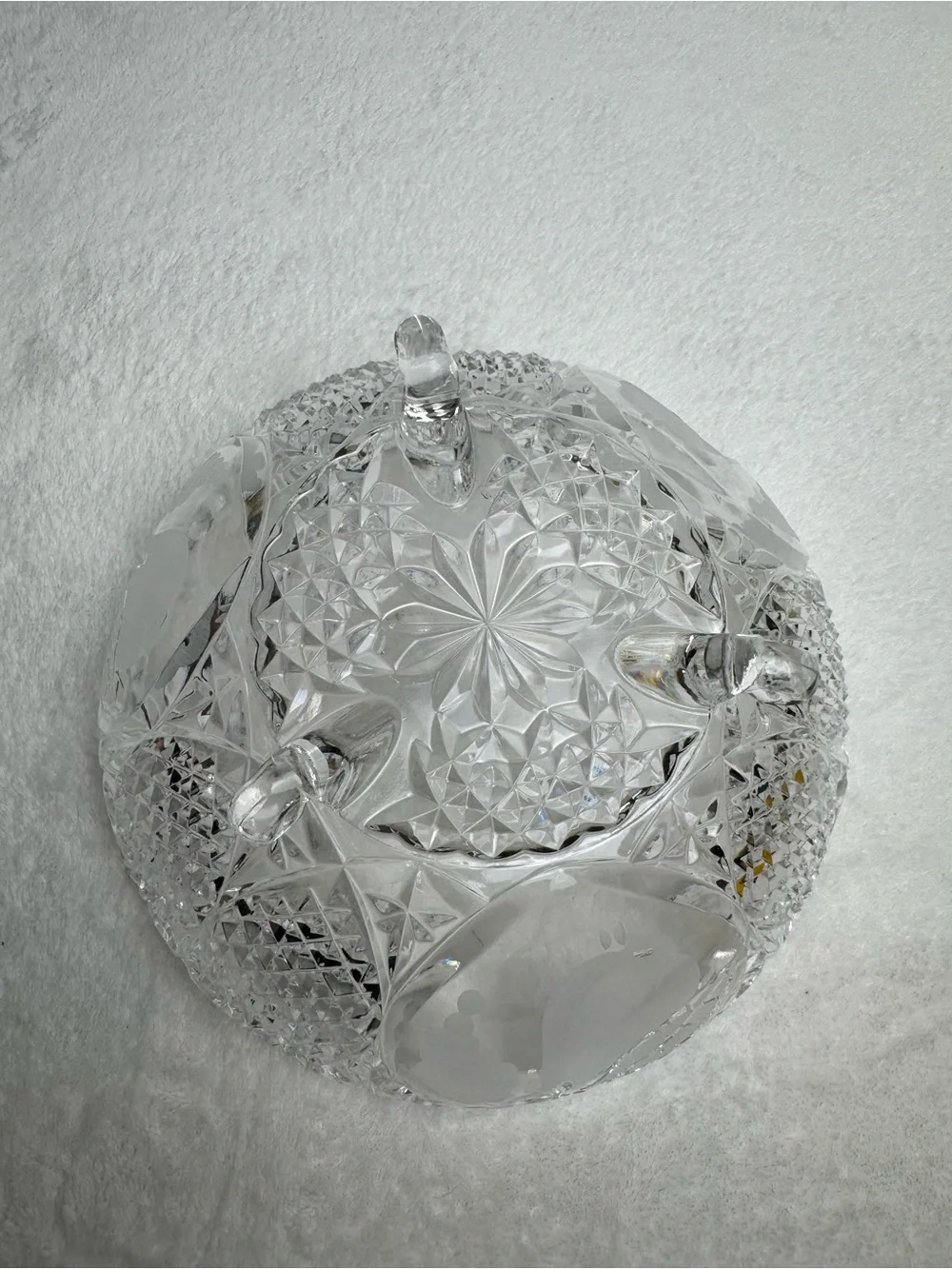 This vintage crystal cut and pressed pear and grape etched footed bowl 8.5”